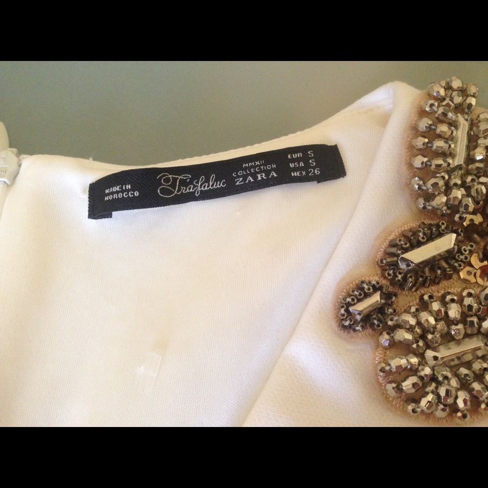 White cocktail dress with decorative beading
